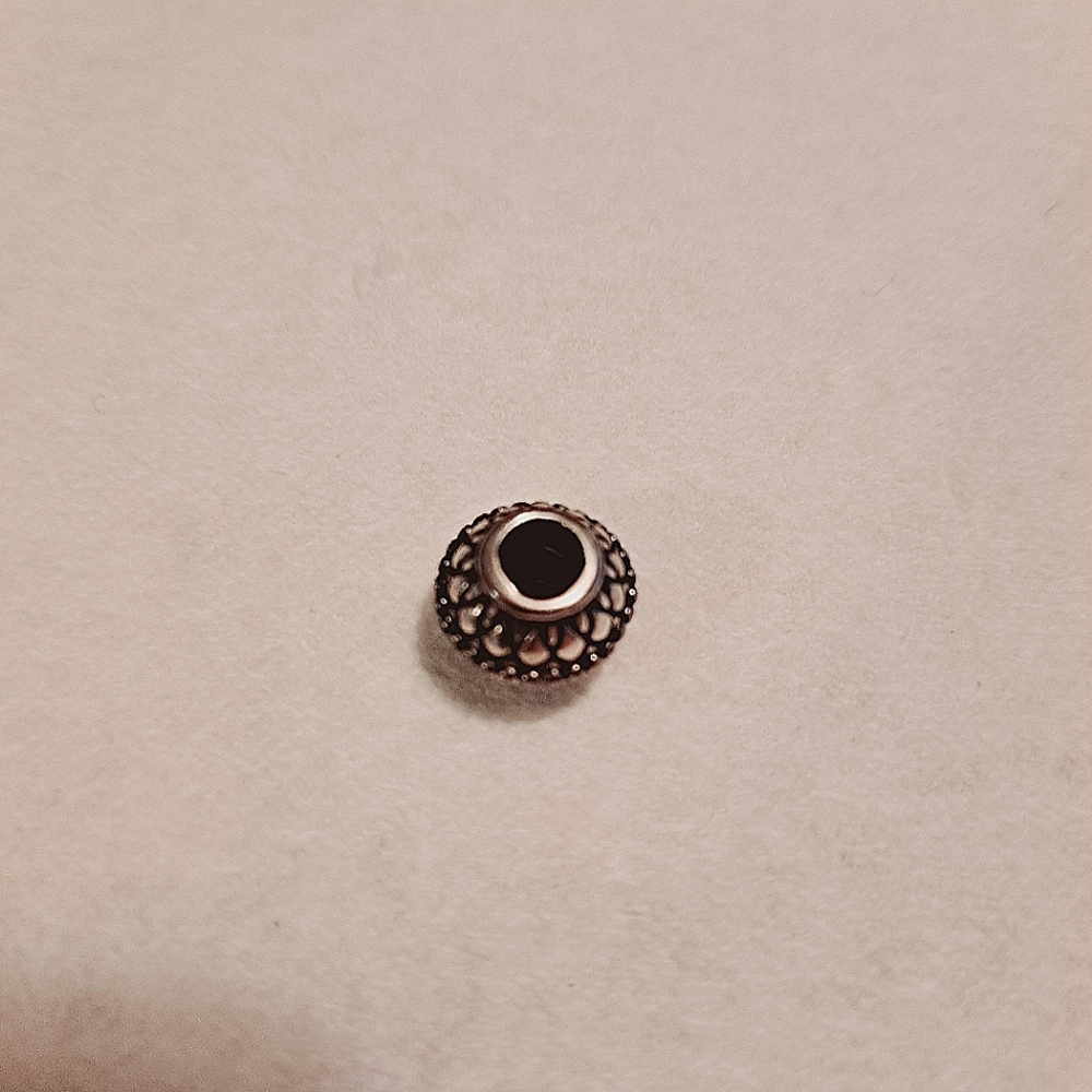Pandora 925 ALE sterling silver "inner strength " bead/charm. Pre-owned. - Picture 2 of 4